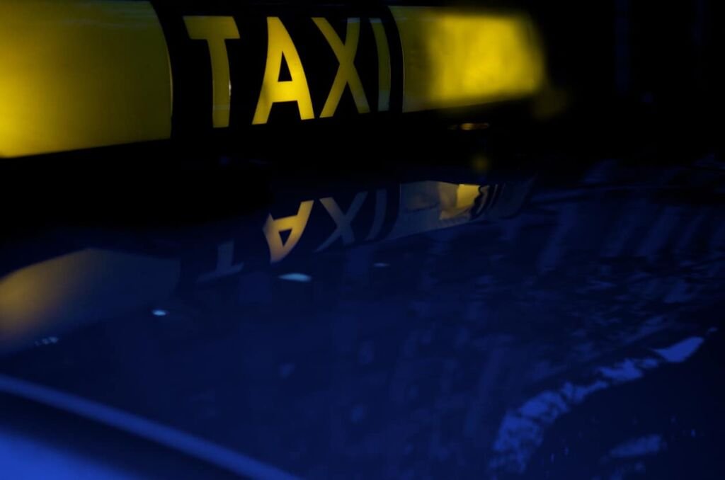 taxi sign in the car