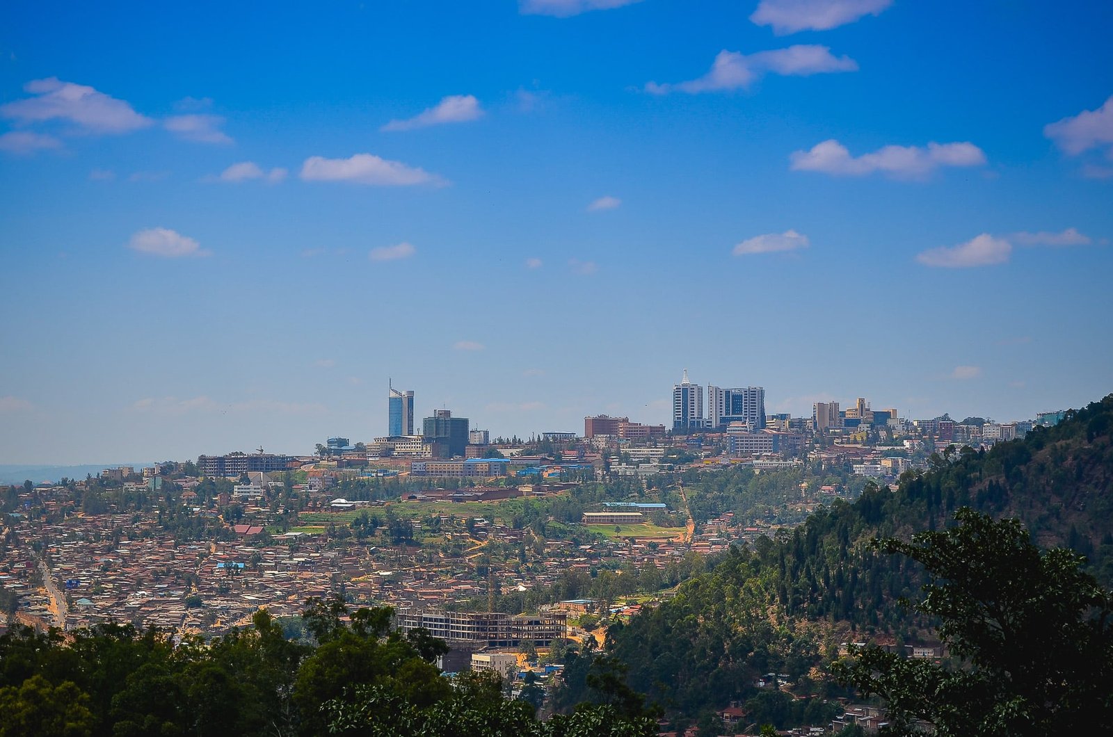 The city of Kigali in Rwanda, buildings rising towards a blue sky