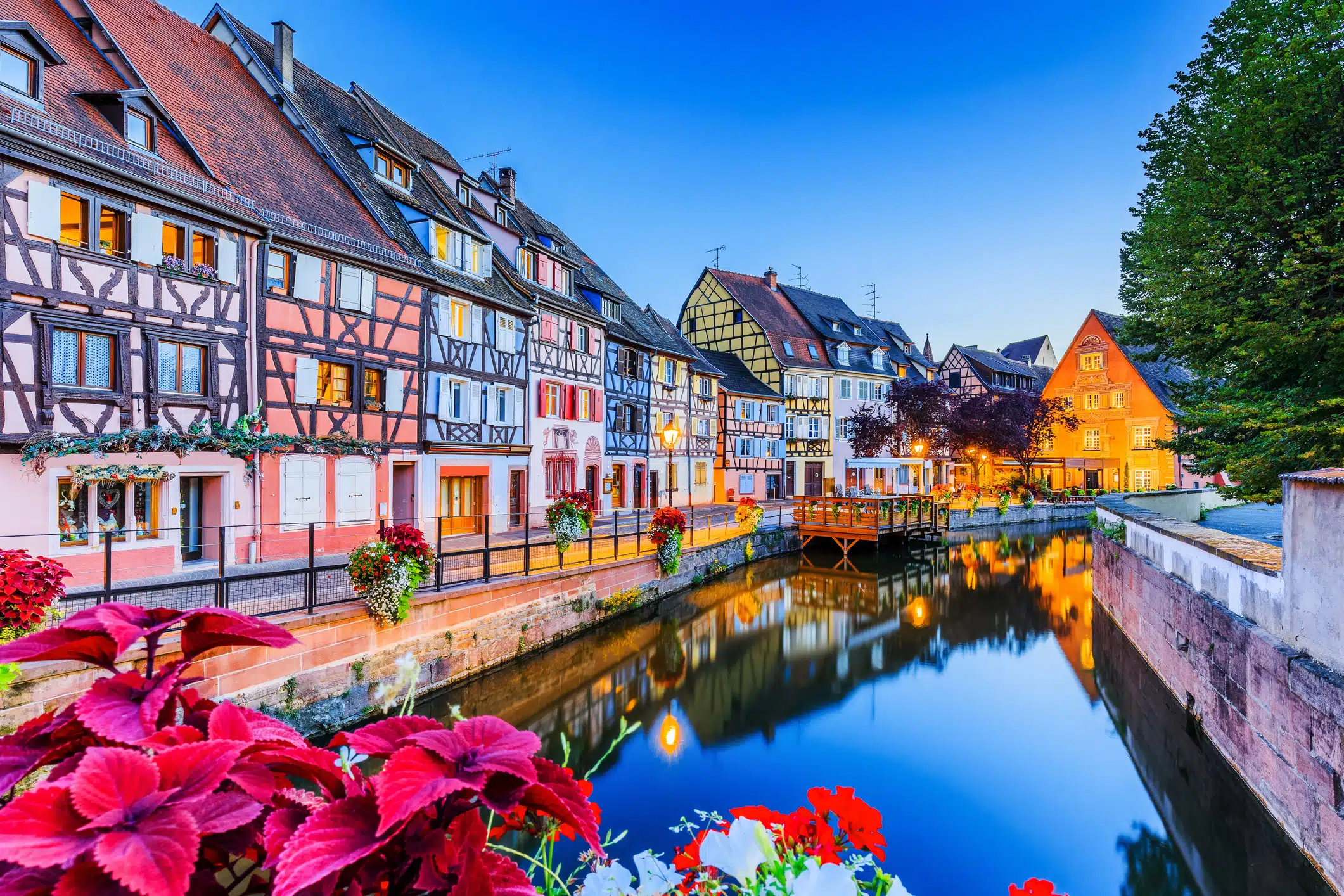 Colmar, Alsace, France. Petite Venice, water canal and traditional half timbered houses.