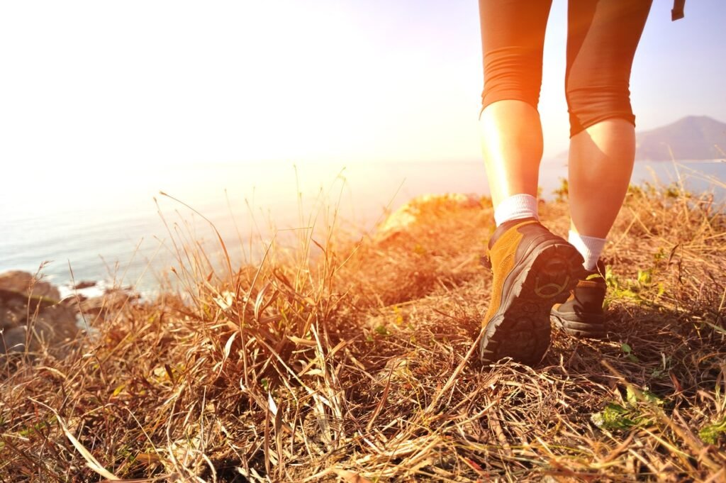 hiking along coast, feet on ground