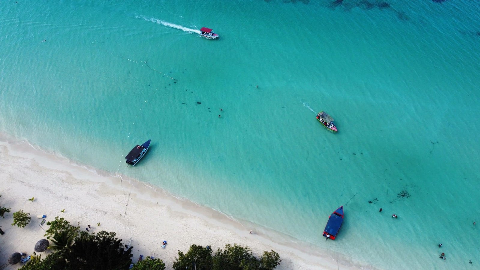 An aerial view of the beautiful coastline of Negril on a bright sunny summer day