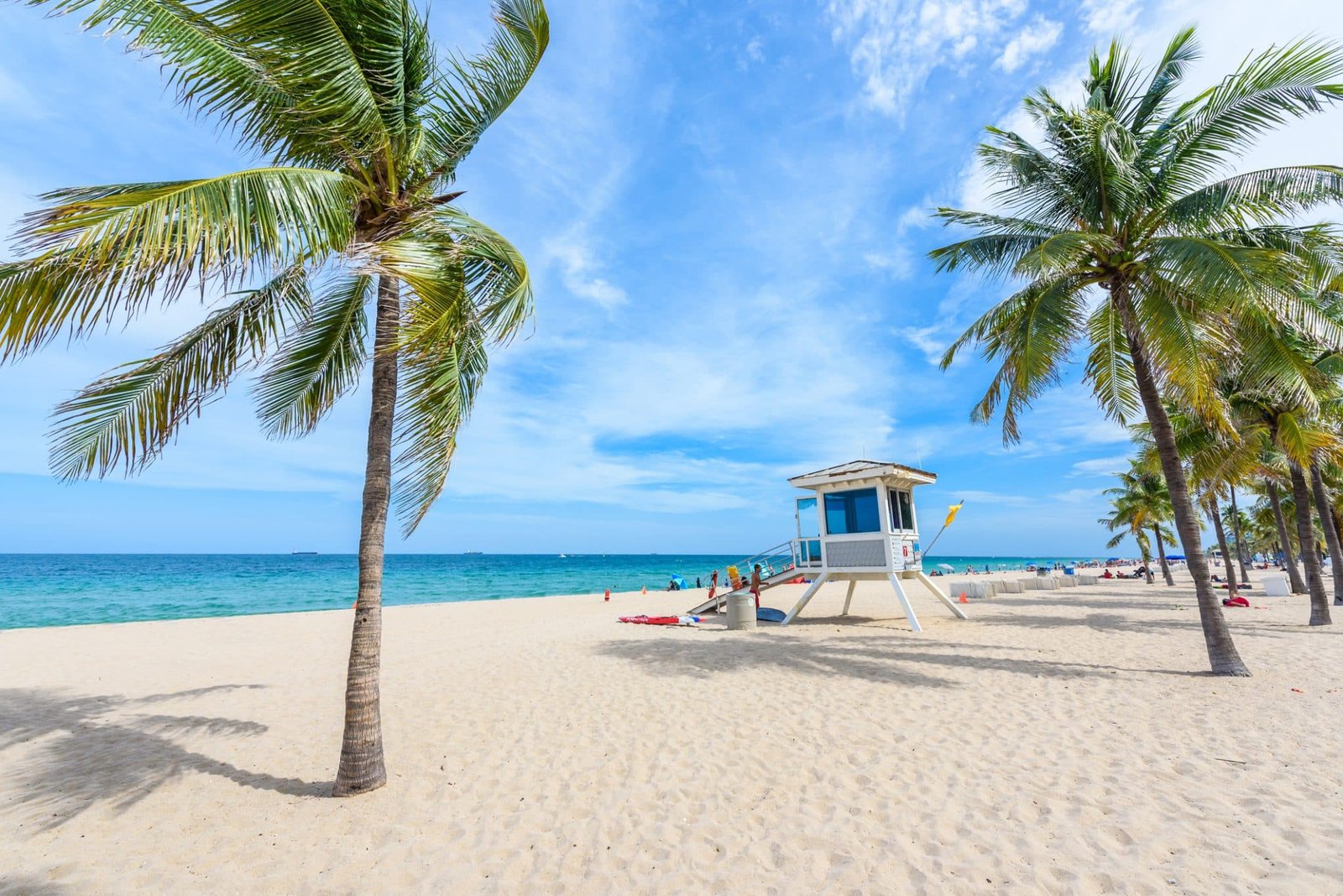 Paradise beach at Fort Lauderdale in Florida on a beautiful sumer day. Tropical beach with palms at white beach.