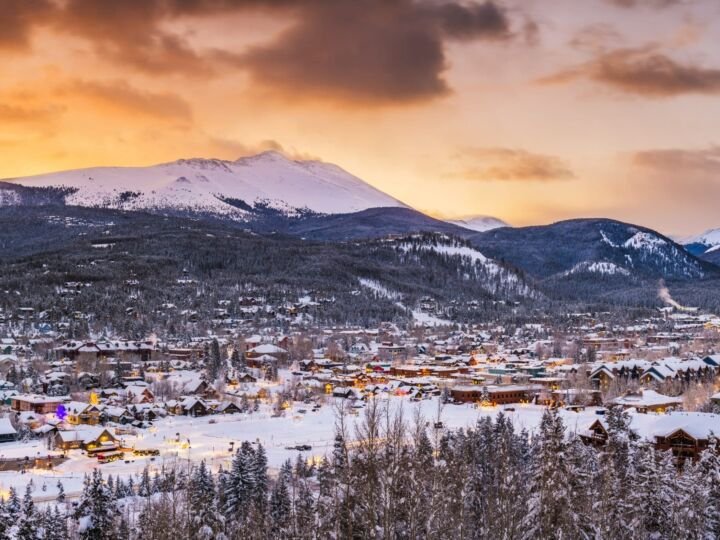 Breckenridge, Colorado, USA ski resort town skyline in winter at dawn.