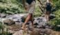 hiking in jungle beside river