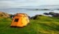 Camping tent on ocean shore