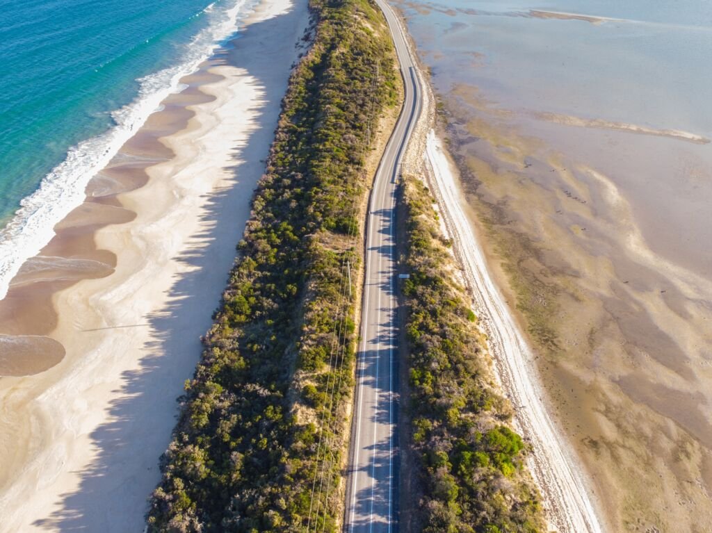 The Neck, separating North and South Bruny. Road flanked by beach either side