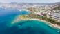 Aerial view of sunny Bodrum with resorts and beachfront villas, Turkey