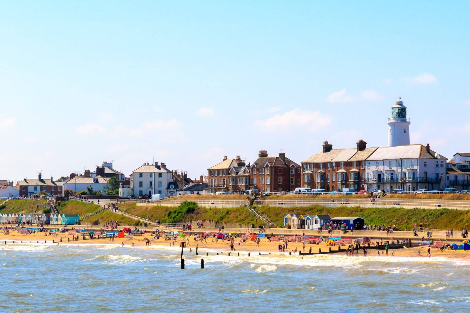 Seaside cottages and lighthouse at Southwold beach, UK
