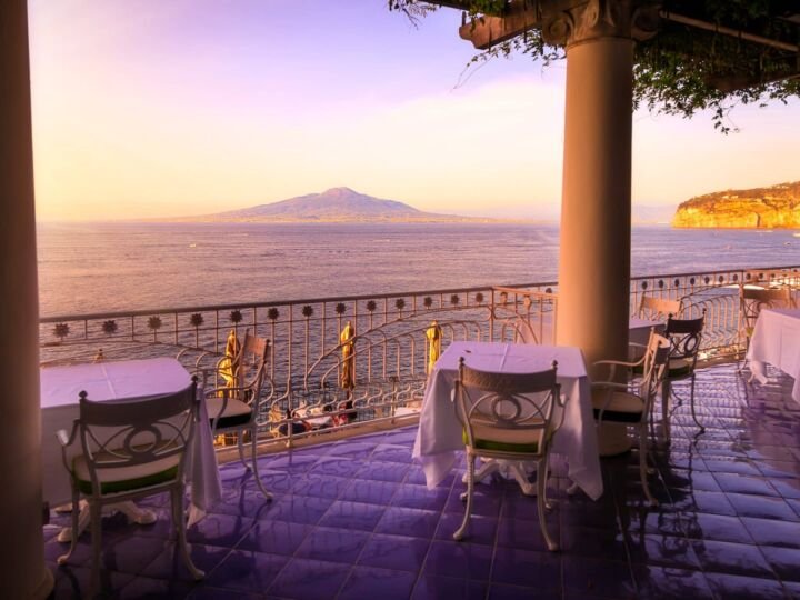 Restaurant with views to the sea and Vesuvius volcano. Sorrento, Italy.