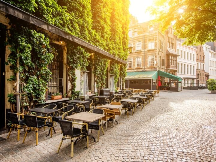 Street view with cafe terrace during the morning in Antwerpen city in Belgium