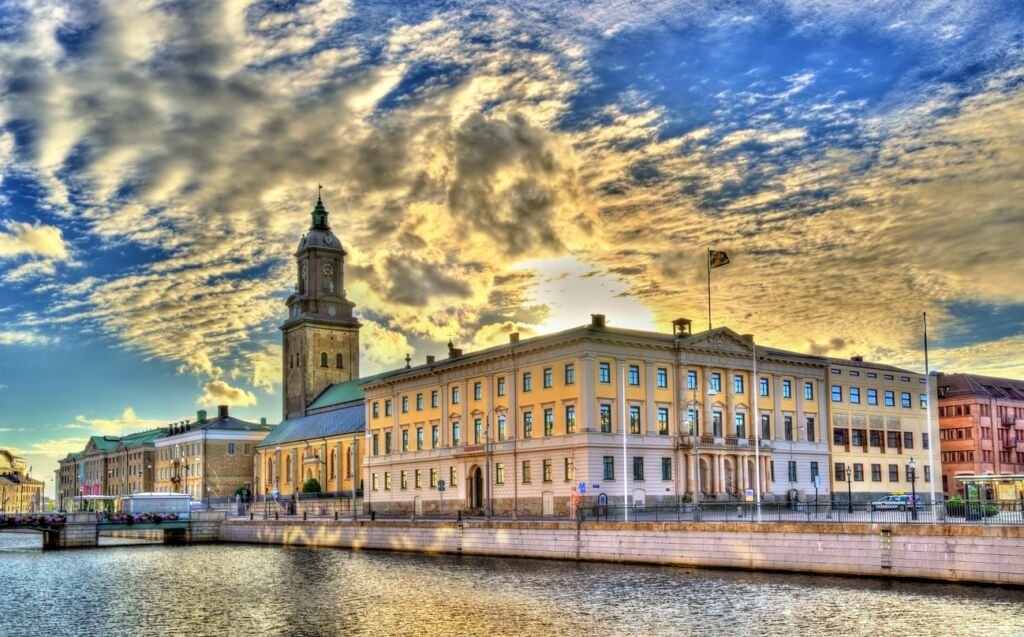 The city hall and the German Church in Gothenburg - Sweden - sun shining through clouds giving a dramatic look