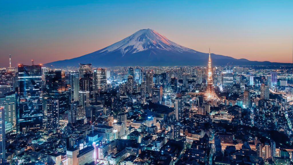 Tokyo's beauty intertwines modern skyscrapers with serene gardens, reflecting a harmonious blend of futuristic vibes and tranquil tradition.