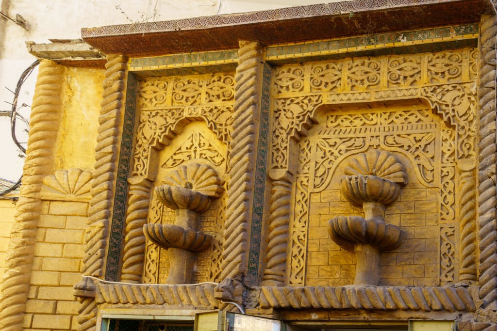 
Intricate stone carvings adorn the walls of the Grand Mosque in Casablanca's Old Medina, a testament to Morocco's rich artistic heritage and Islamic architectural prowess.