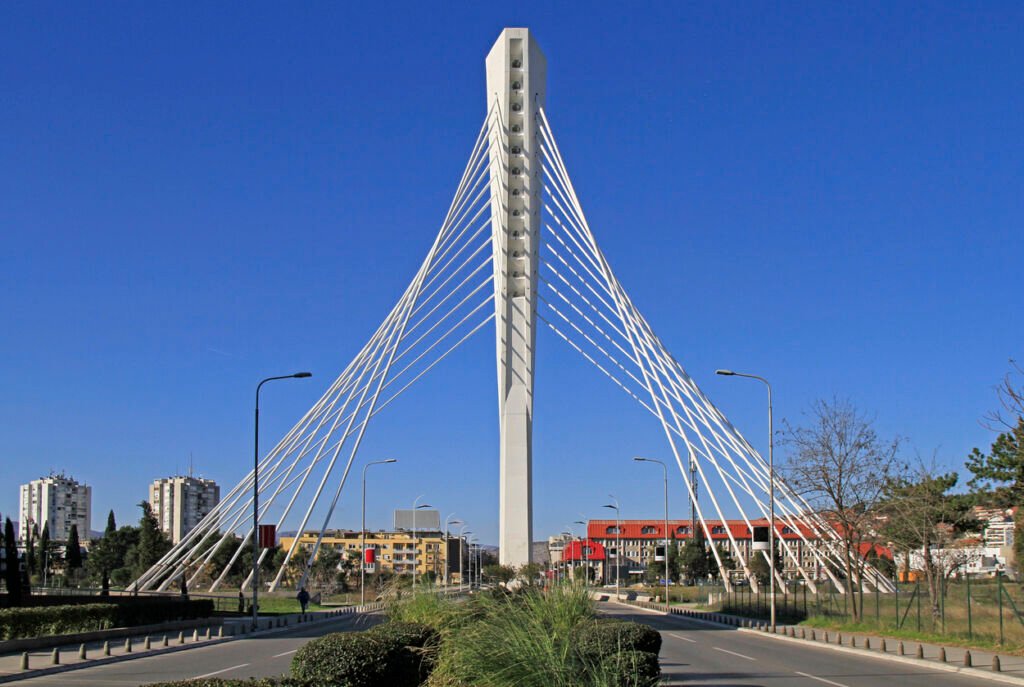 The Millennium Bridge in Podgorica, Montenegro: A sleek, cable-stayed marvel, where modernity's elegance seamlessly blends with the city's scenic beauty, defining the nation's evolving urban narrative.
