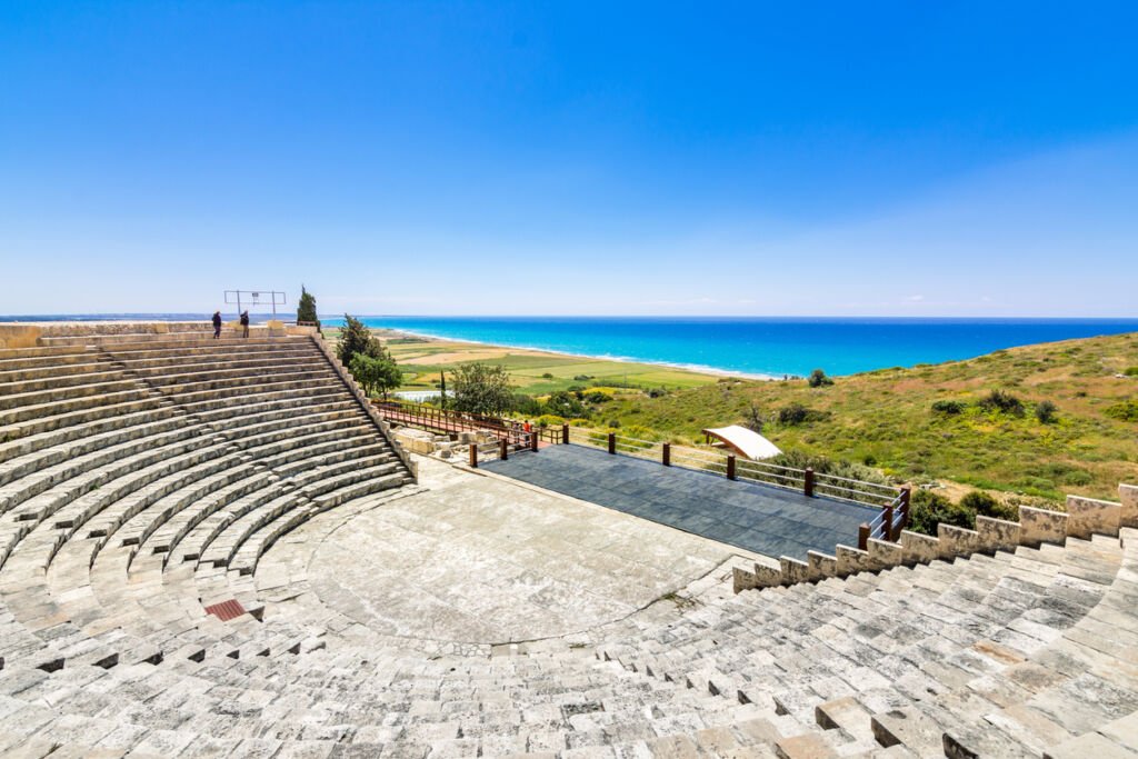 Ancient Kourion's Roman theater: a breathtaking relic overlooking the azure Mediterranean. Its weathered stone seats echo stories, embracing the sea's beauty—a timeless stage amidst Cyprus' history.