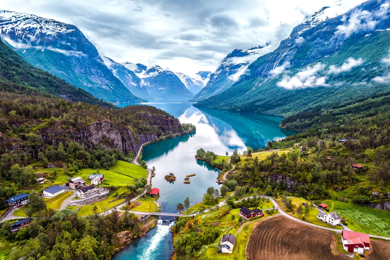 Norway's breathtaking beauty unfolds from above: Aerial photography captures nature's masterpiece. Majestic mountains, winding fjords, and pristine landscapes create a symphony of awe-inspiring scenes in stunning Norway.
