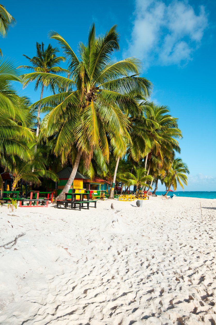 Johnny Cay, a Caribbean gem off San Andrés Island, beckons with its pristine shores. Turquoise waters caress the white sands, offering a serene paradise framed by vibrant coral reefs.