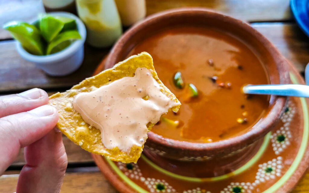 Savor the rich flavors of Aztec Mexican soup in a Playa del Carmen restaurant, Quintana Roo, Mexico. A culinary journey blending tradition and taste in the heart of vibrant Mexican cuisine.