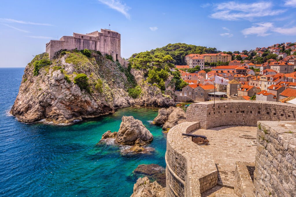 Dubrovnik, Croatia, a coastal jewel framed by ancient walls. Terracotta rooftops dotting limestone streets, the Adriatic's azure embrace, and centuries of history etched in every stone.