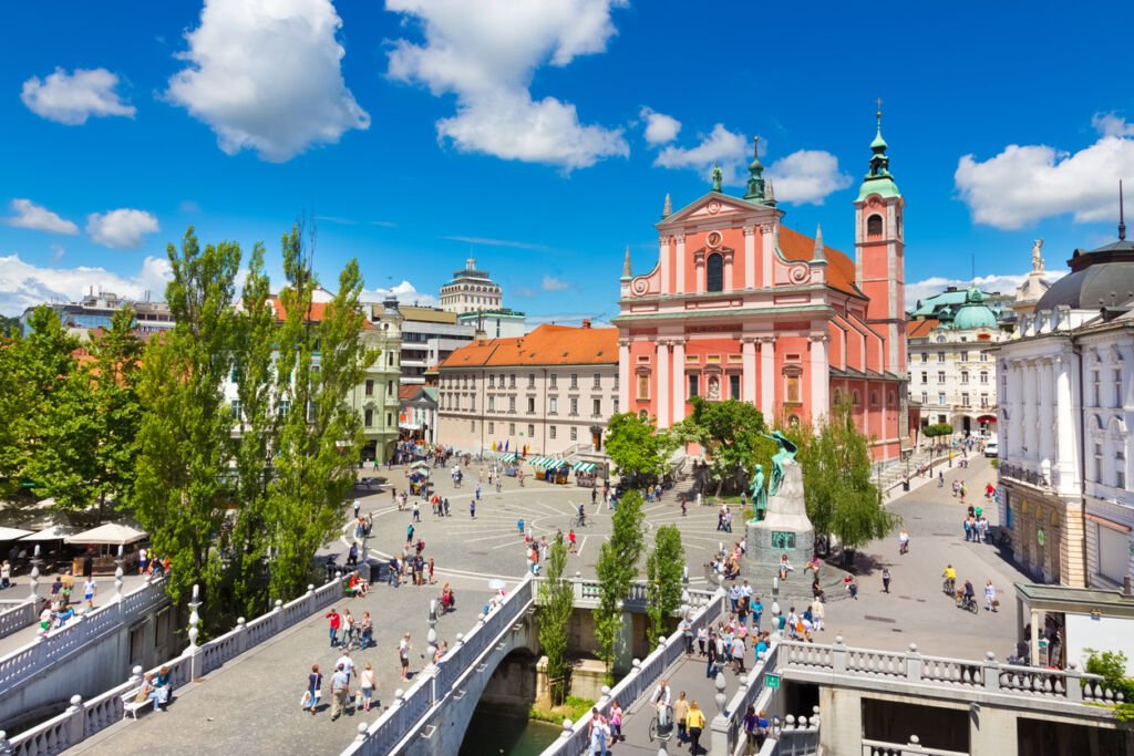Ljubljana's city center exudes romance with the graceful River Ljubljanica, the iconic Triple Bridge (Tromostovje), Preseren Square, and the timeless Franciscan Church of the Annunciation. Slovenia's heart, where Europe's charm blossoms.